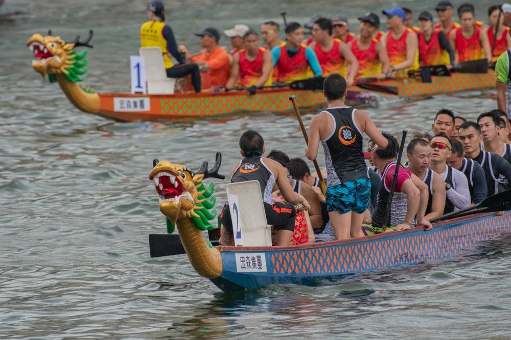 Tourism rises ahead of the Dragon Boat Festival. Boats racing in the Love River for the Dragon Boat Festival in Aberdeen Hong Kong.shutterstock_2321460653